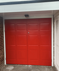 Red side hinged garage door Lichfield